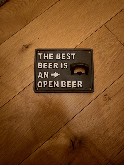 Funny beer bottle opener for kitchen with a humorous sign reading 'The best beer is an open beer'