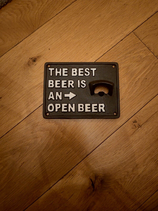 Funny beer bottle opener for kitchen with a humorous sign reading 'The best beer is an open beer'