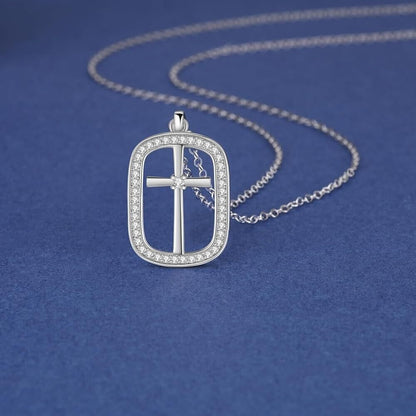 Sterling silver cross necklace for women featuring a delicate design with sparkling accents