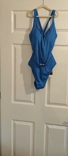 George womens blue swimsuit size 14 hanging on a door showcasing a stylish design for summer wear