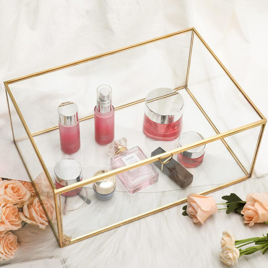Homtone gold glass terrarium box displaying various beauty products and accessories elegantly arranged