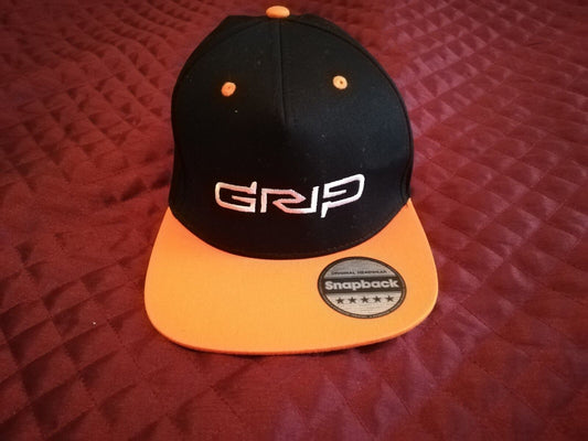 Grip video game snapback hat featuring a black and orange design for gamers