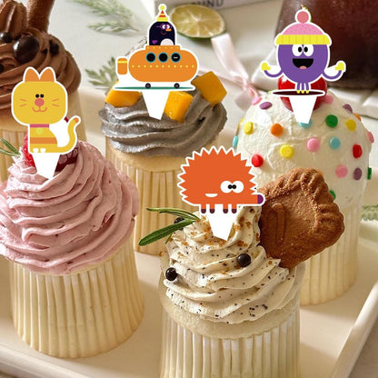 Hey Duggee birthday party decorations featuring colourful cupcake toppers on delicious cupcakes