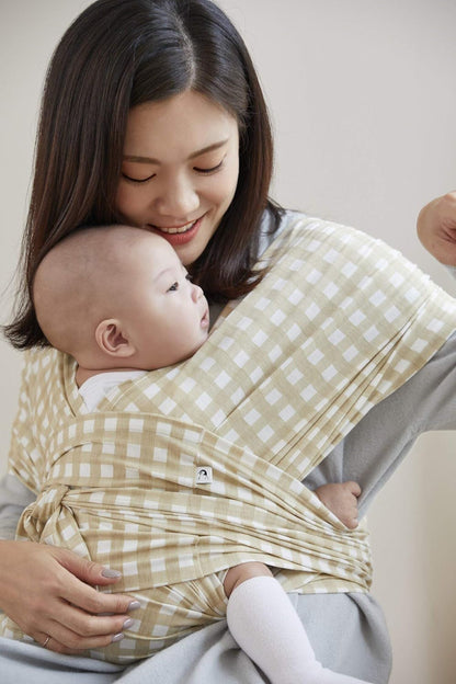 Konny lightweight infant carrier for mums in a soft checkered design, providing comfort for parents and babies