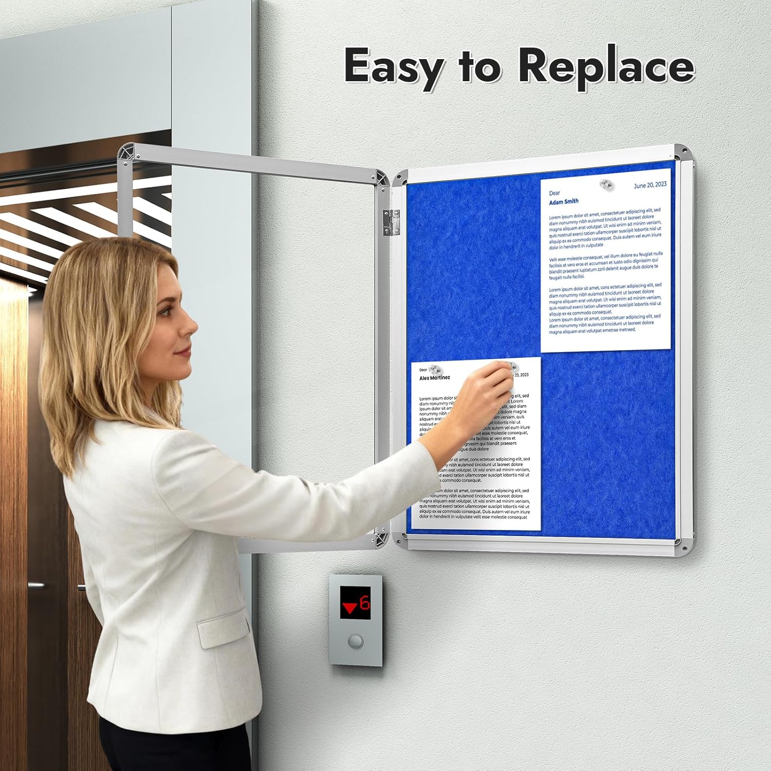 Sliandtelly lockable notice board in use, showcasing easy paper replacement for secure display