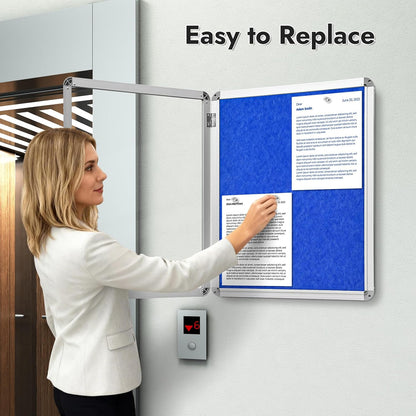 Sliandtelly lockable notice board in use, showcasing easy paper replacement for secure display
