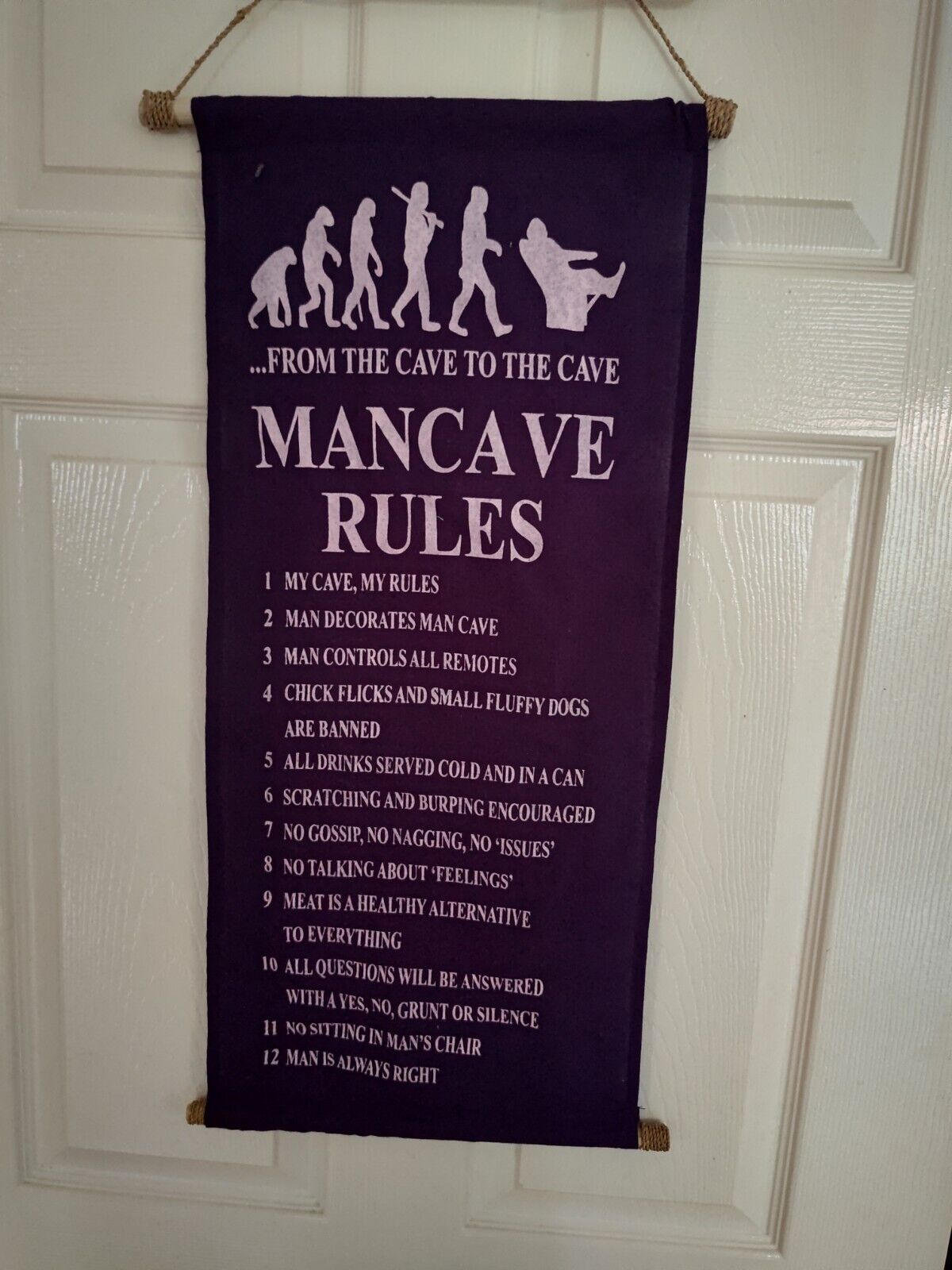 Purple man cave rules sign featuring humorous rules for a man cave decor