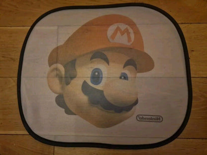 Nintendo Mario and Luigi car sun shades featuring Mario's iconic face design