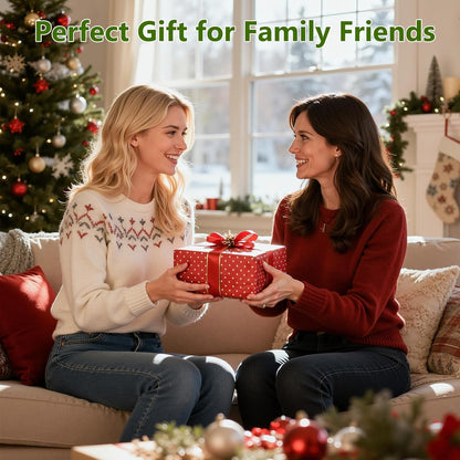 Two women exchanging a gift in a festive living room with a matcha whisk set for tea lovers