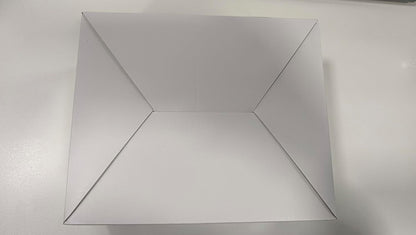 Top view of an unbranded white box for the Phomemo M220 portable barcode printer