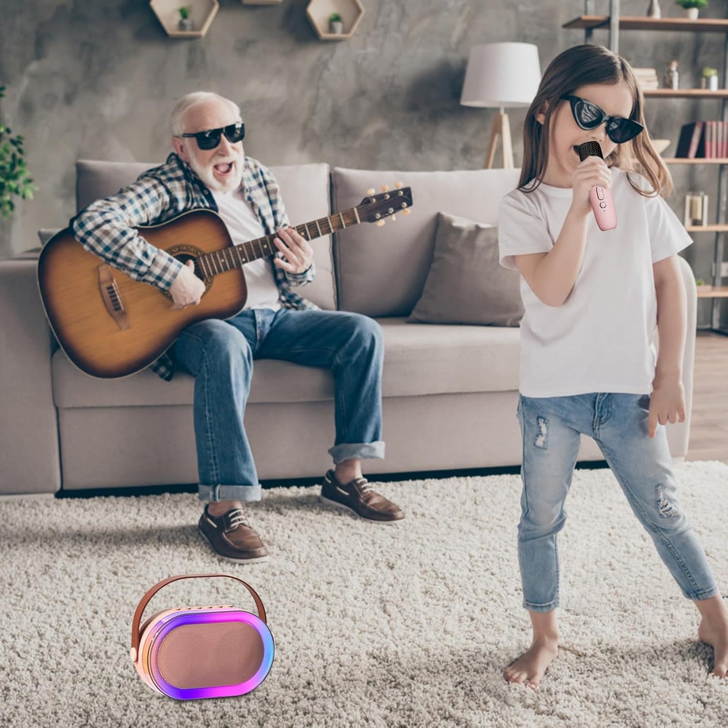 Pink Bluetooth karaoke machine with child singing and guitarist in a living room setting