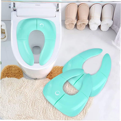 Portable potty training seat for toddlers in light blue, easy to place on standard toilet for child use