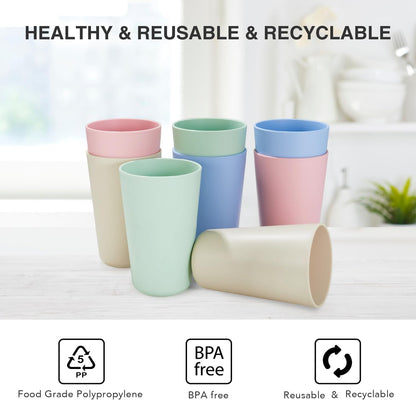 Assorted reusable plastic drinking cups in pastel colours for eco-friendly kitchenware