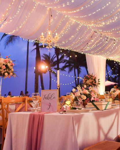 Elegant table setting featuring rose gold candle holders set for a beautiful outdoor event