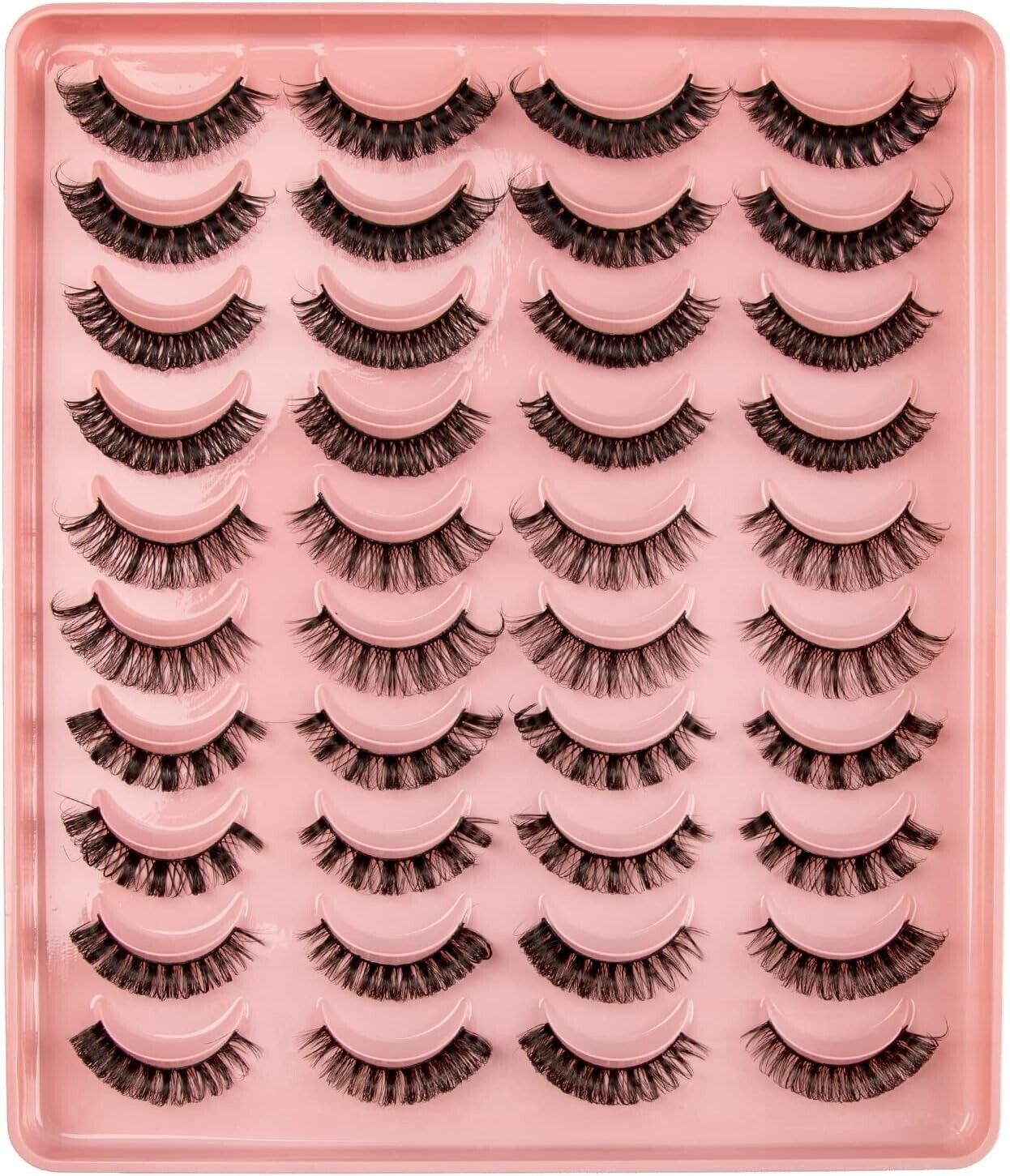 Collection of Russian strip lashes in various styles on a pink tray for glamorous eye looks