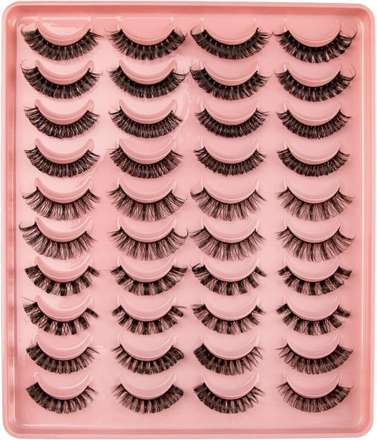 Collection of Russian strip lashes in various styles on a pink tray for glamorous eye looks