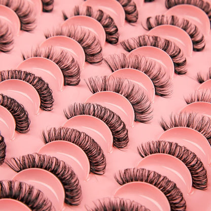 Variety of Russian strip lashes displayed on a pink background for dramatic eye enhancement