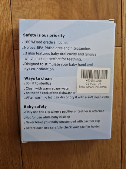 Silicone pacifier clip instructions, highlighting safety and cleaning tips for baby care