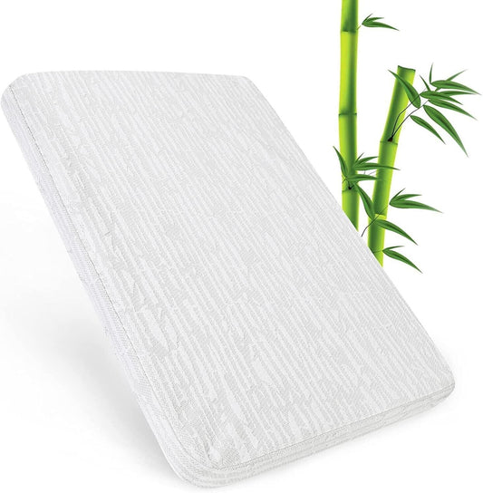 Sprintspirit cot mattress for travel in white with a bamboo design, ideal for infants and toddlers