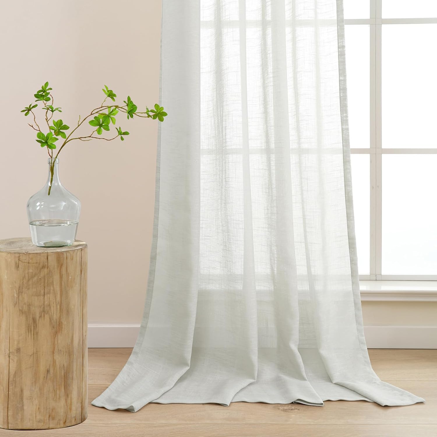 L.Z.E silver grey semi sheer kitchen curtains elegantly draping in a bright, modern kitchen setting