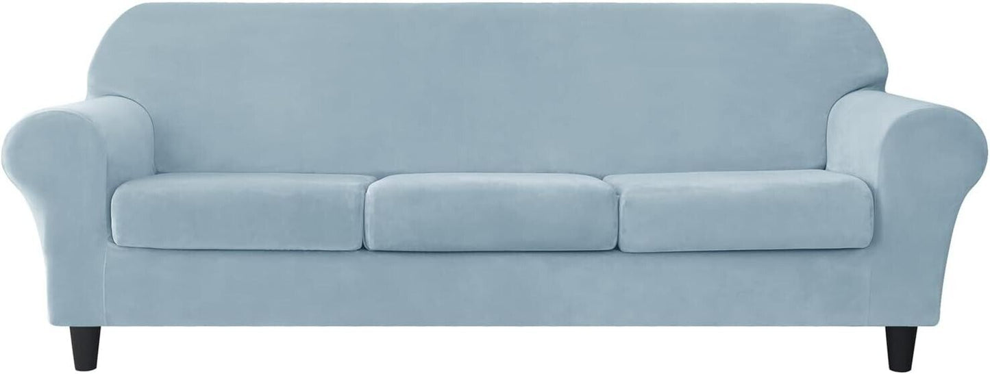 Light blue stretch velvet sofa slipcover designed for a modern three-seater sofa with soft texture