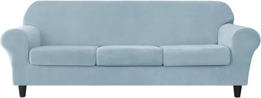 Light blue stretch velvet sofa slipcover designed for a modern three-seater sofa with soft texture