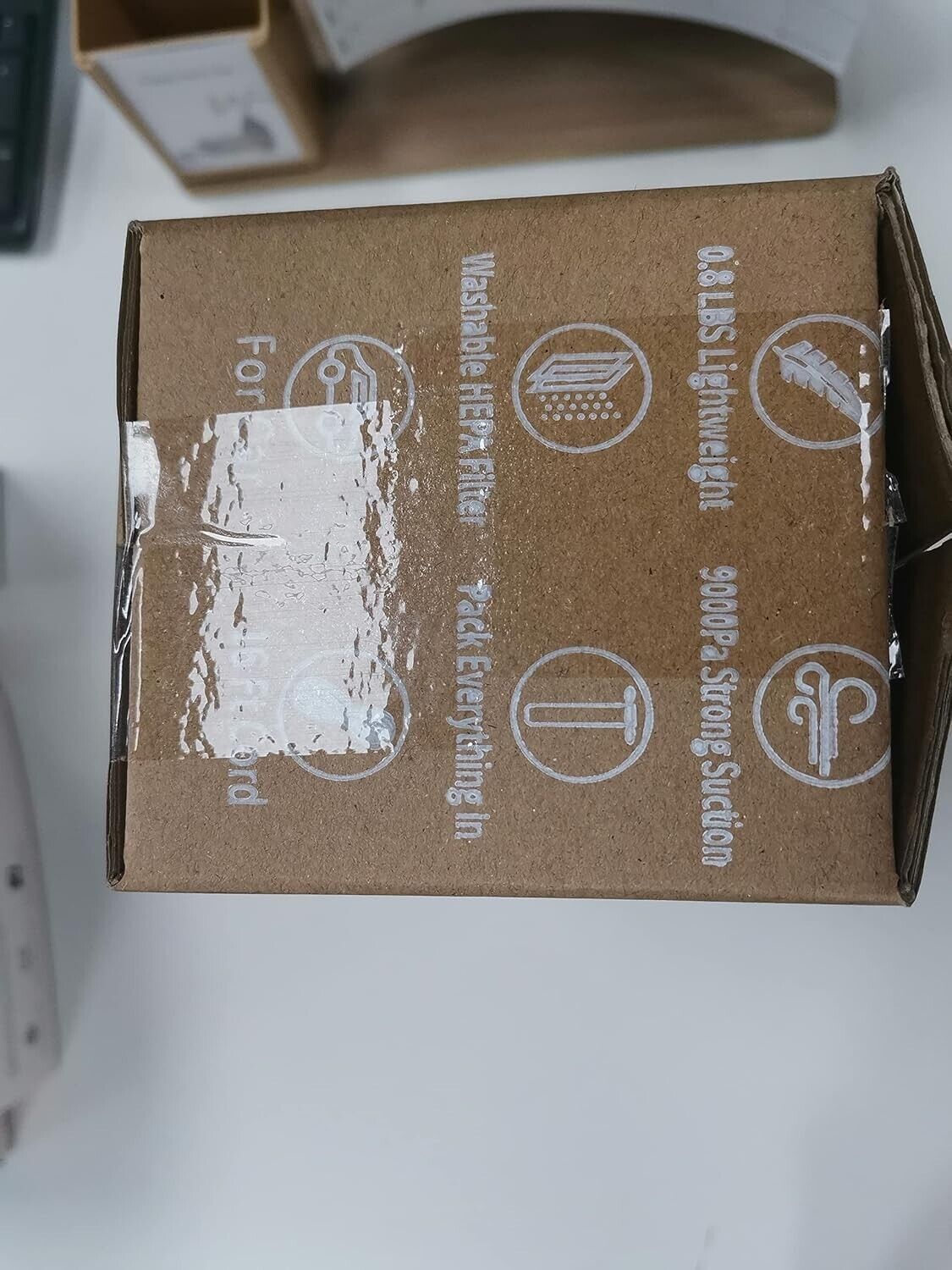 Temola car vacuum cleaner packaging featuring a washable HEPA filter and powerful suction features