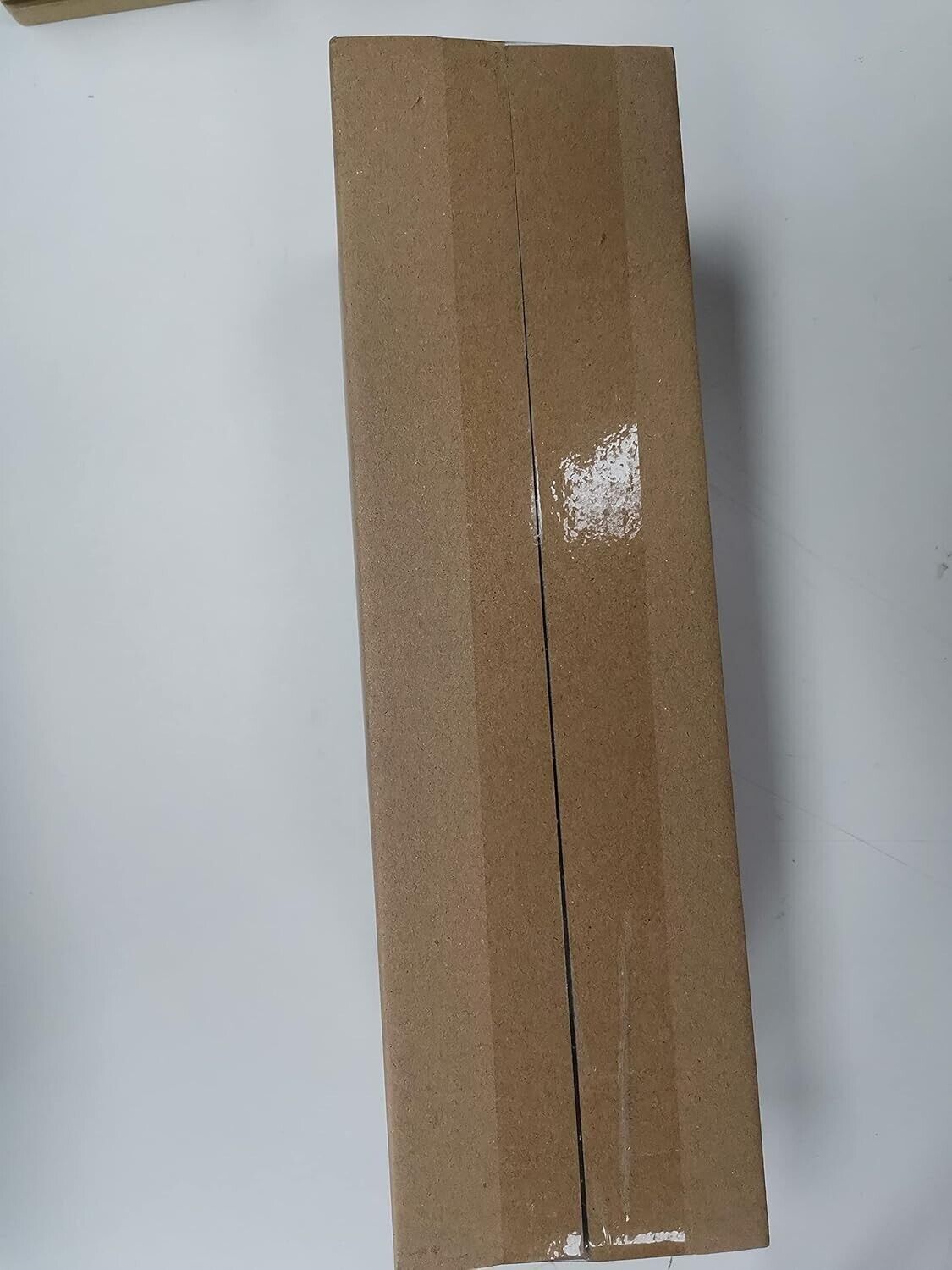 Temola car vacuum cleaner packaged in a brown box for easy transport and storage
