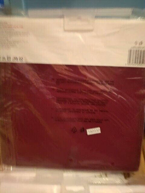 Tesco fabric storage box in burgundy colour, ideal for organising and decluttering spaces