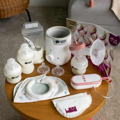 Tommee Tippee complete breastfeeding kit including bottles, pump, and storage bags for feeding convenience.