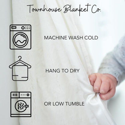 Care instructions for Townhouse Blanket Co blue baby chenille blanket showing washing and drying methods