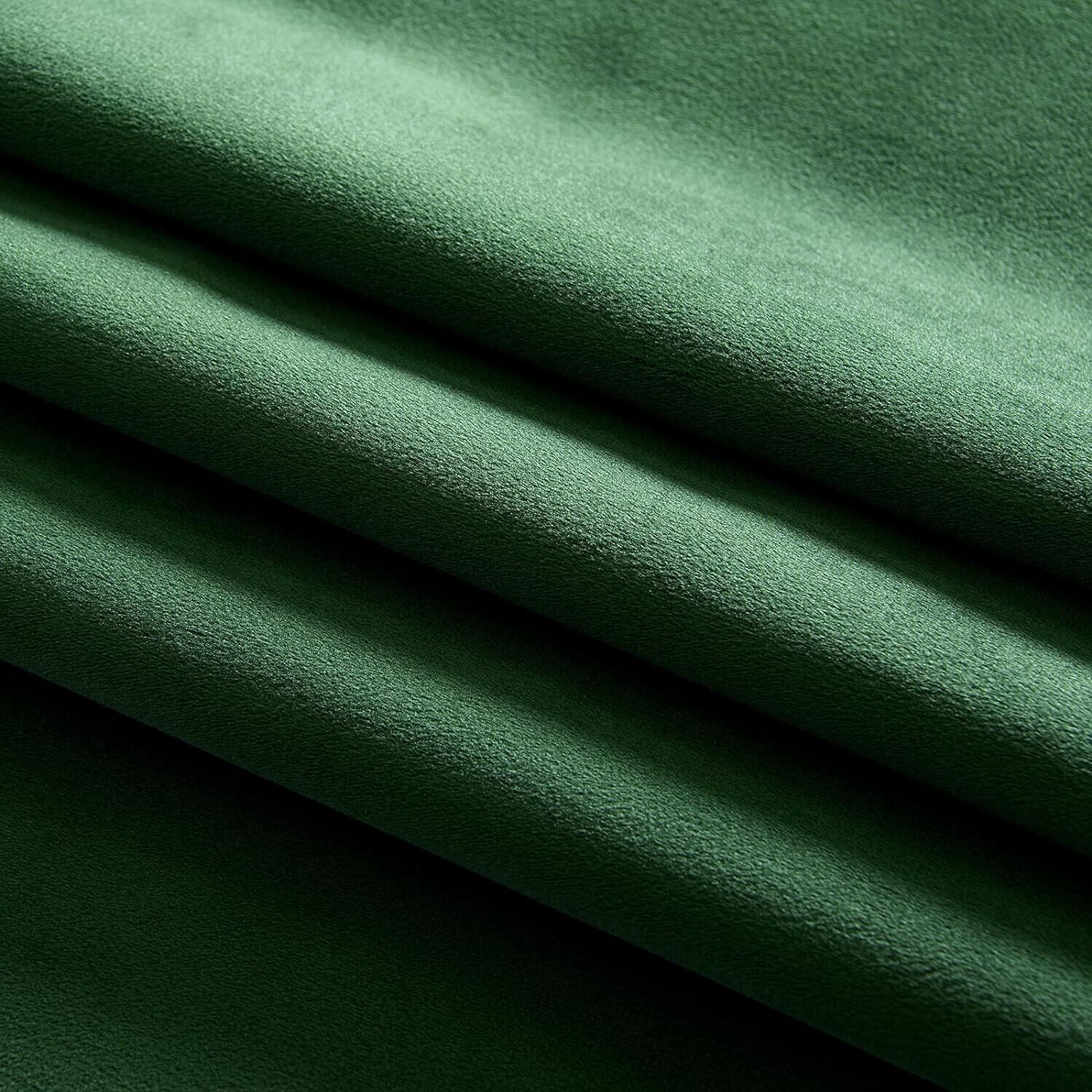 Luxurious green velvet blackout curtains for optimal light blocking and privacy