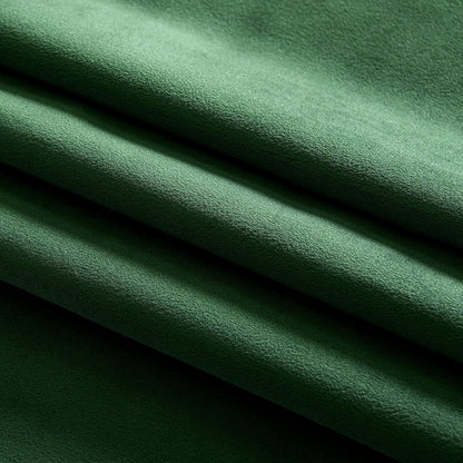 Luxurious green velvet blackout curtains for optimal light blocking and privacy