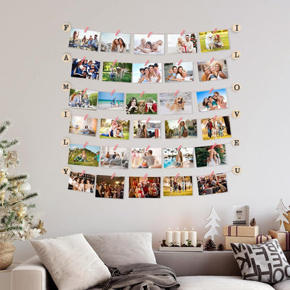 Wall mounted photo holder pink showcasing family photos in a decorative arrangement on a living room wall