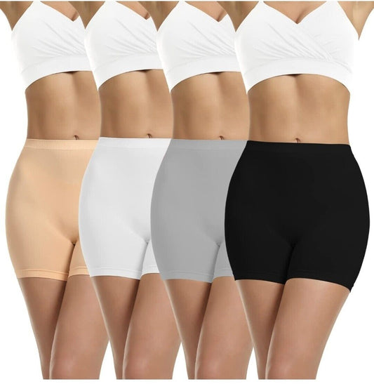 Four pairs of womens seamless slip shorts in nude, white, grey, and black for comfortable layering
