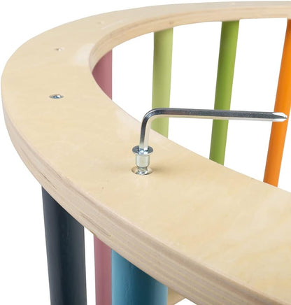 Close-up of Bigjigs Toys wooden arched climbing frame highlighting colourful bars and assembly details