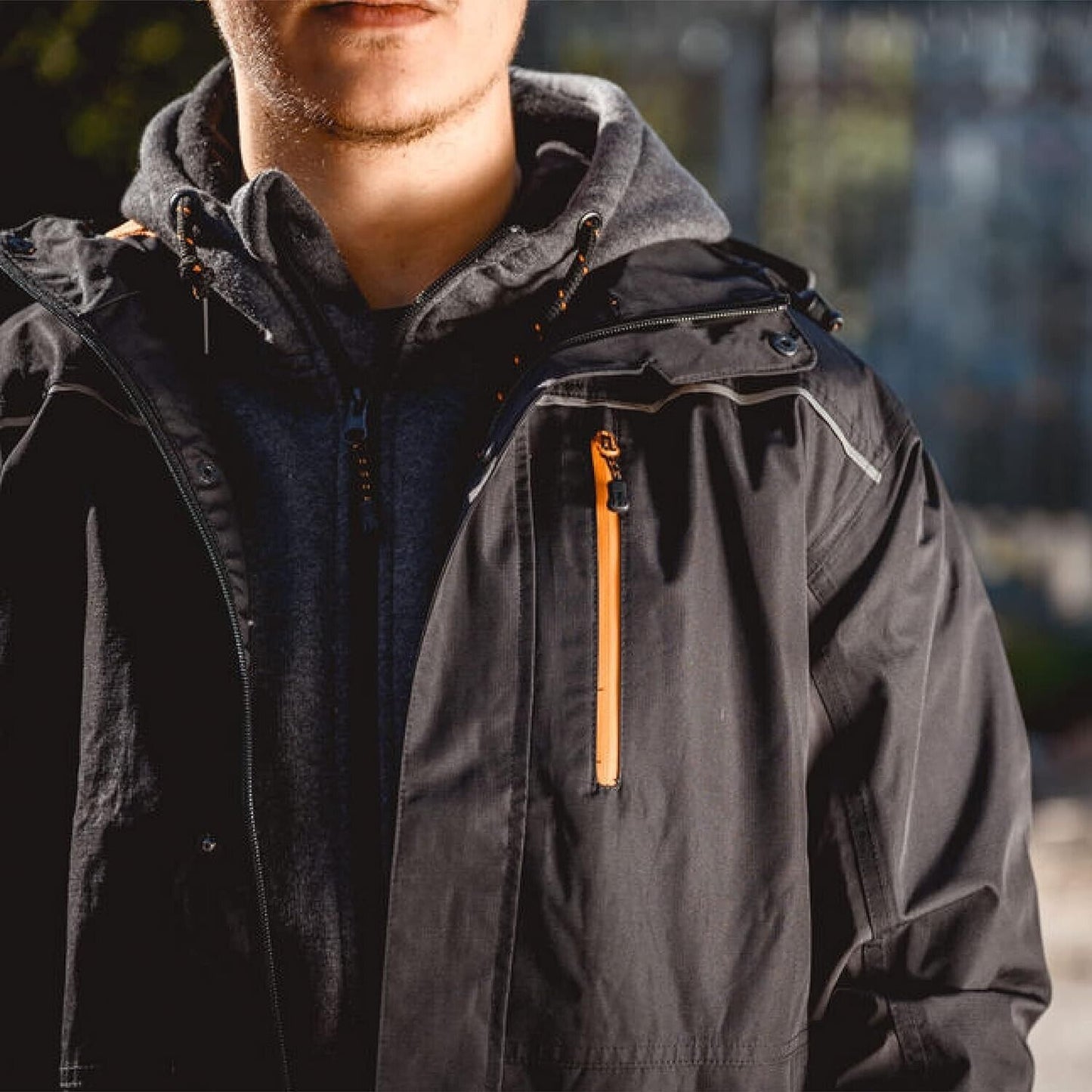 Men's waterproof work jacket from The Trading Warehouse featuring a stylish design and practical pockets