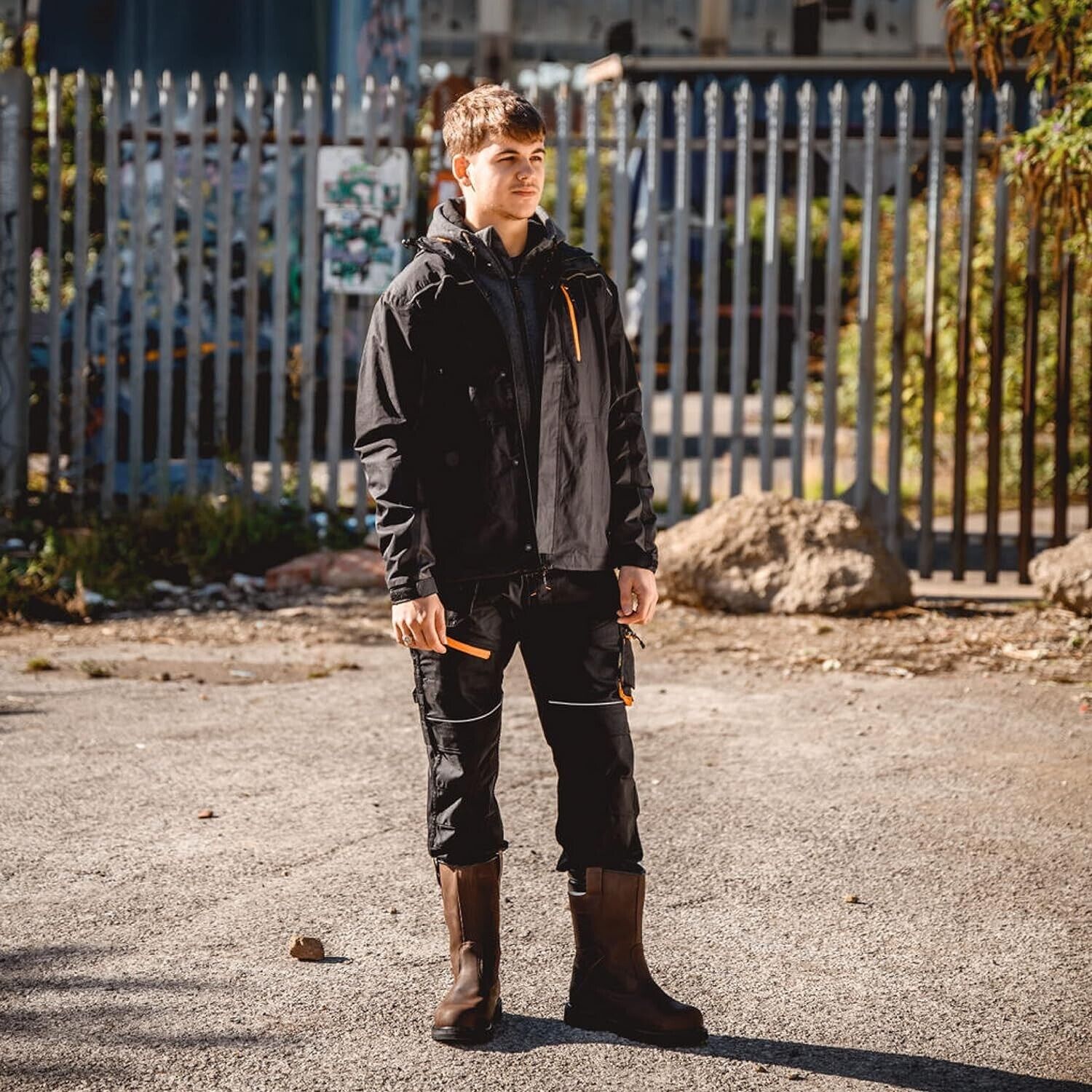 Men's waterproof work jacket from The Trading Warehouse, ideal for outdoor work in wet conditions